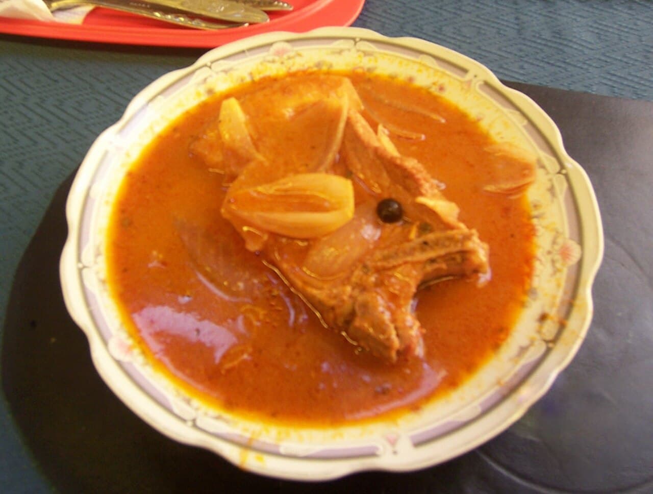 Braised pork dish at a Peruvian restaurant — adobo arequipeño tradition