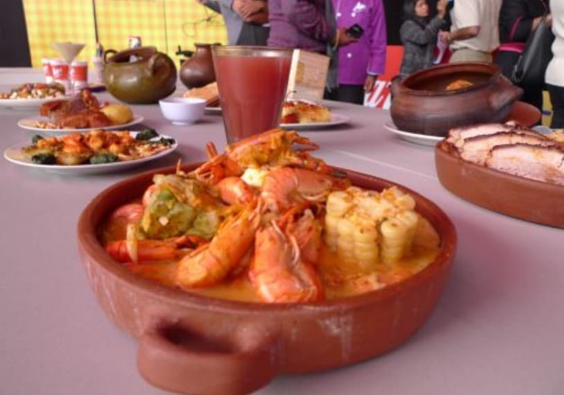 Traditional Arequipa dishes — rocoto relleno and chupe de camarones